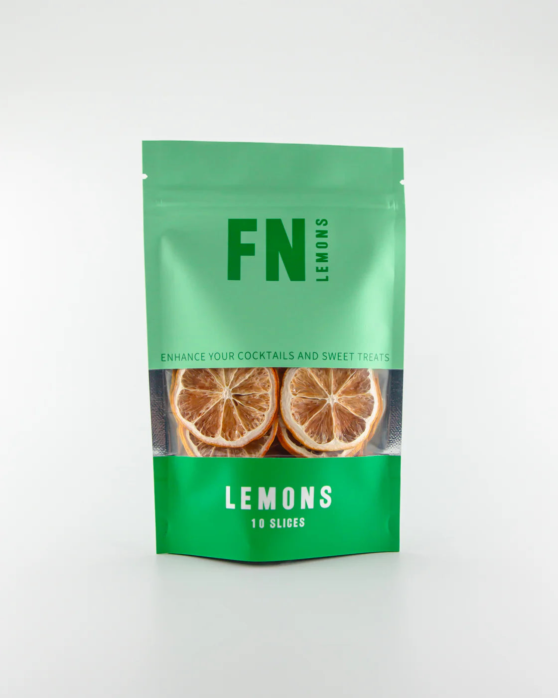 Green package of 'FN Lemons' with lemon slices on a white background